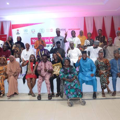 Group of young people standing together for a photograph, representing youth participation and collective voices in the 2024 Humanitarian Response Plan Youth Lens Report Card.